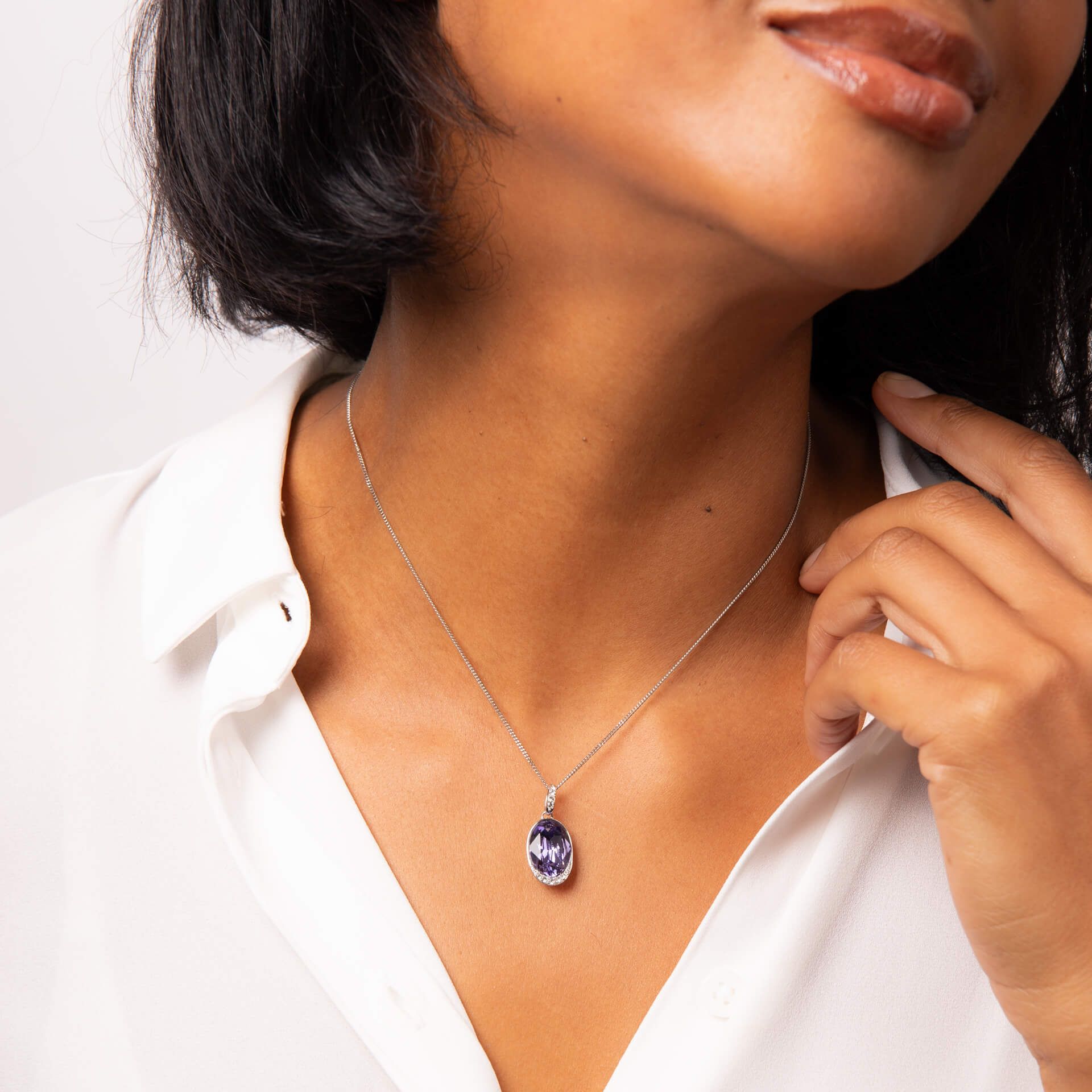 Fiorelli Oval Tanzanite Crystal Pendant with Cubic Zirconia Wave