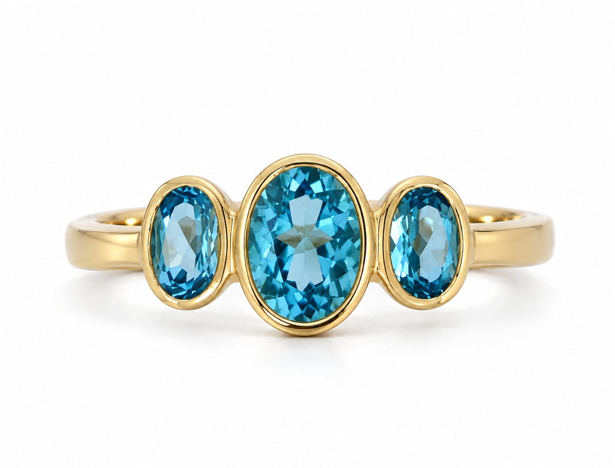 9ct Yellow Gold Oval Swiss Blue Topaz Three Stone Ring