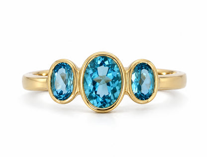 9ct Yellow Gold Oval Swiss Blue Topaz Three Stone Ring
