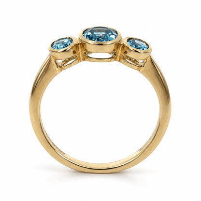 9ct Yellow Gold Oval Swiss Blue Topaz Three Stone Ring