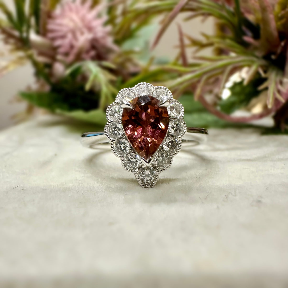 18CT White Gold Pink Pear Cut Tourmaline with Diamond Halo Ring