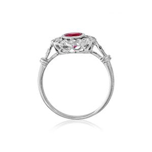 18Ct. White Gold Ruby Cluster and Diamond Ring with Round Centre